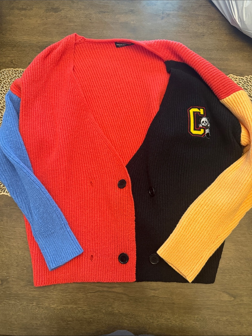 Colorblock Red and Black women’s Cardigan with Blue and Yellow Sleeves